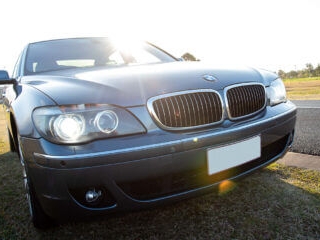 BMW 750 Li Greyfront shot with lights on