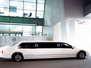 Ford LTD 8 Seater Side View Outside A Building