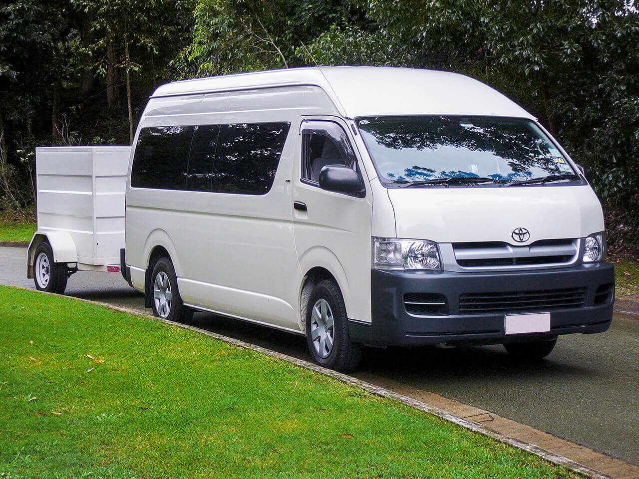 Toyota Hi Ace 13 Seater Side View With Luggage Trailer