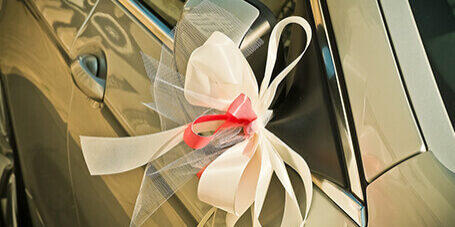 wedding car hire with silk bow